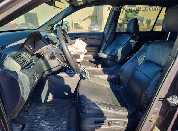 5FNYF8H07KB015717 2019 HONDA PASSPORT Charcoal Front interior view