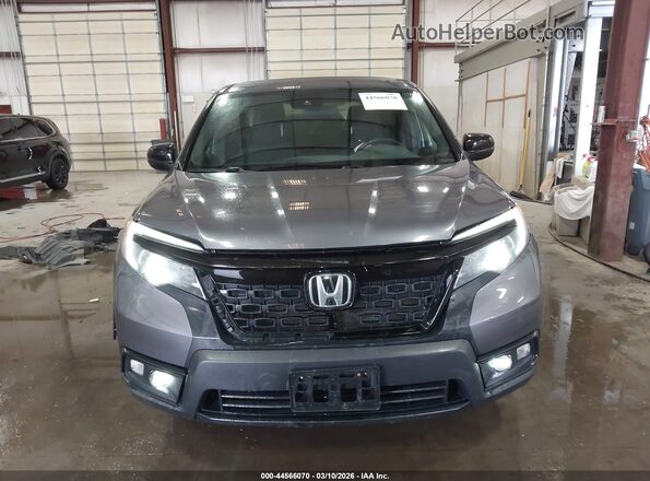 5FNYF8H22MB011255 2021 HONDA PASSPORT Gray Vista interior trasera