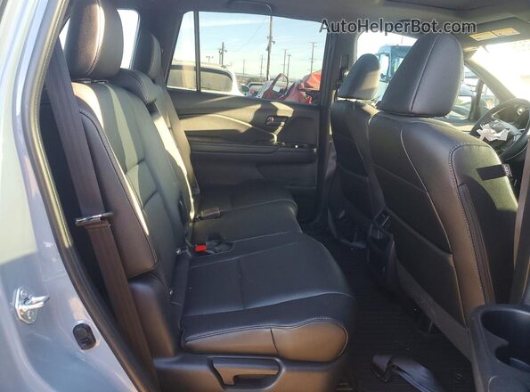 5FNYF8H50PB019286 2023 HONDA PASSPORT Gray Սալոնի հետևի տեսք