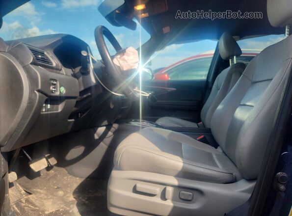 5FNYF8H52MB034562 2021 HONDA PASSPORT Blue Front interior view