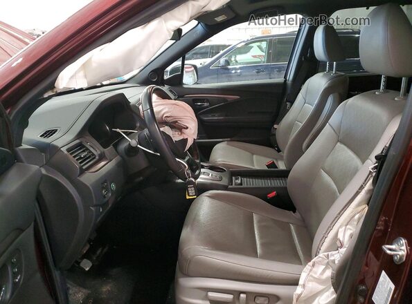 5FNYF8H56MB035259 2021 HONDA PASSPORT Maroon წინა სალონის ხედი