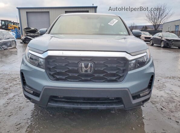 5FNYF8H56PB005909 2023 HONDA PASSPORT Blue Widok z przodu