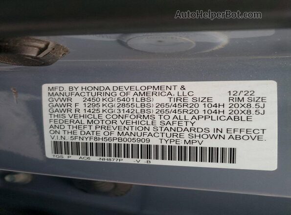 5FNYF8H56PB005909 2023 HONDA PASSPORT Blue Widok naklejki z numerem VIN