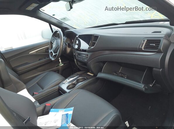 5FNYF8H57PB039406 2023 HONDA PASSPORT White Vista interior delantera