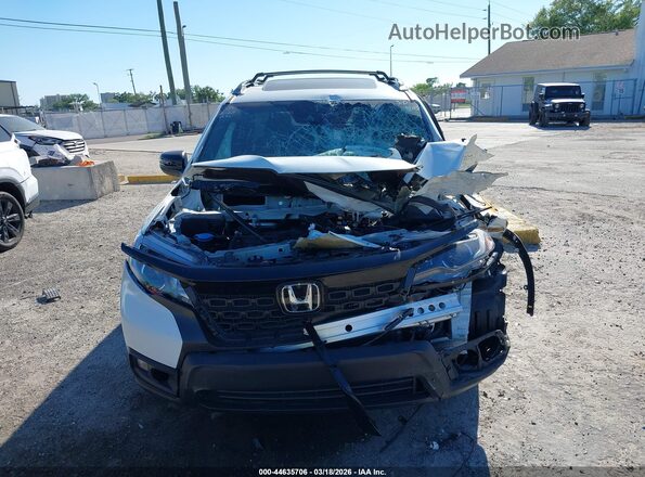 5FNYF8H58MB037949 2021 HONDA PASSPORT White Rear interior view