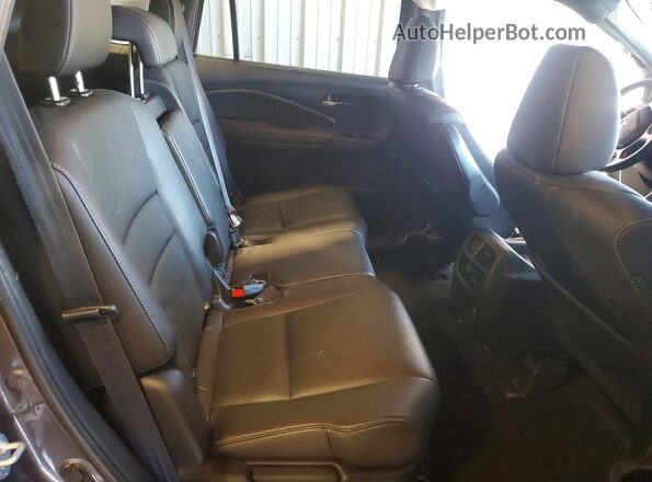 5FNYF8H59MB021713 2021 HONDA PASSPORT Gray Vista interior trasera