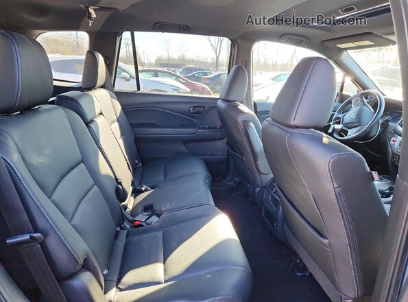 5FNYF8H5XPB034975 2023 HONDA PASSPORT Silver Vista interior trasera