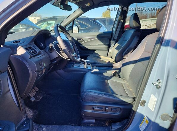 5FNYF8H5XPB034975 2023 HONDA PASSPORT Silver Vista interior delantera