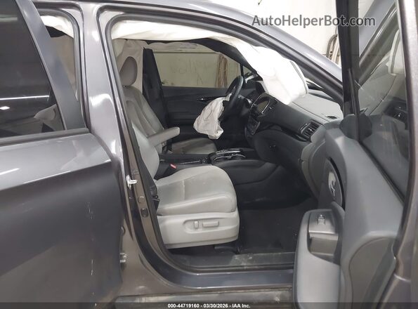 5FNYF8H90MB040685 2021 HONDA PASSPORT Gray Front interior view