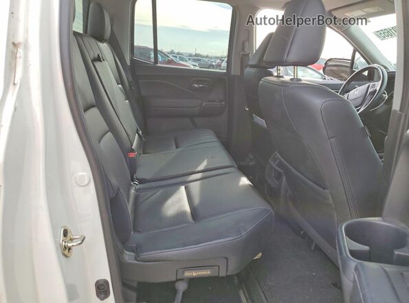 5FPYK3F75HB027492 2017 HONDA RIDGELINE White Vista de los asientos traseros