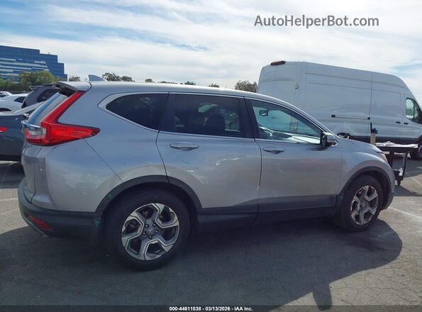 5J6RW1H80KA035599 2019 HONDA CR-V Silver Widok wnętrza z tyłu