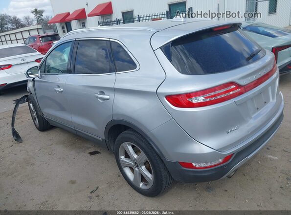 5LMCJ1C93HUL33865 2017 LINCOLN MKC Silver უკანა მარცხენა
