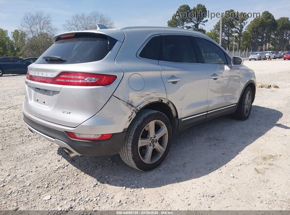 5LMCJ1C97HUL68716 2017 LINCOLN MKC Silver Trasero derecho