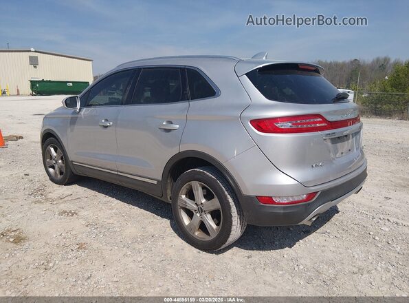 5LMCJ1C97HUL68716 2017 LINCOLN MKC Silver Trasero izquierdo
