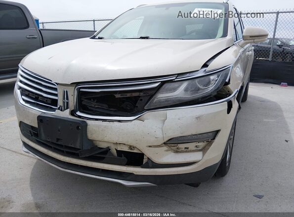 5LMCJ2C9XJUL04438 2018 LINCOLN MKC Tan Front view
