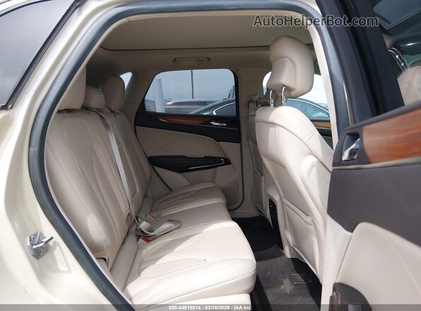 5LMCJ2C9XJUL04438 2018 LINCOLN MKC Tan VIN sticker view
