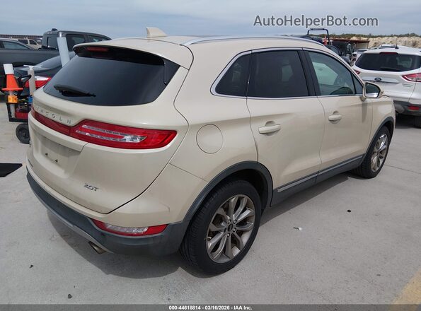 5LMCJ2C9XJUL04438 2018 LINCOLN MKC Tan Rear right