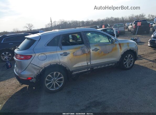 5LMCJ2D92KUL44299 2019 LINCOLN MKC Silver Rear right