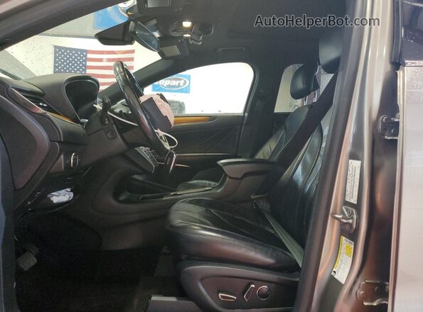 5LMCJ3D90HUL03278 2017 LINCOLN MKC Tan Vista interior delantera