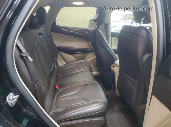 5LMCJ3D92HUL32023 2017 LINCOLN MKC Black Vista interior trasera