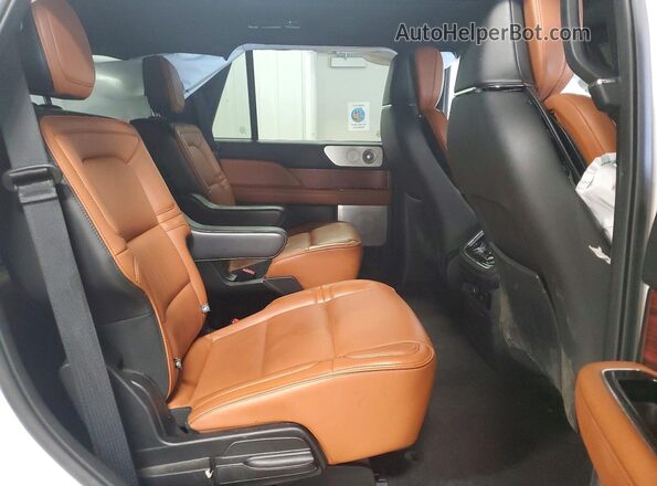 5LMJJ2LT4KEL26322 2019 LINCOLN NAVIGATOR White Rear interior view