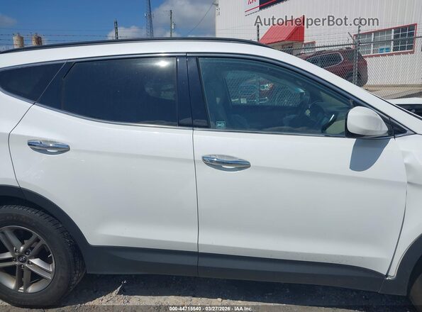 5NMZU3LB2HH017937 2017 HYUNDAI SANTA FE SPORT White Вид задньої частини салону