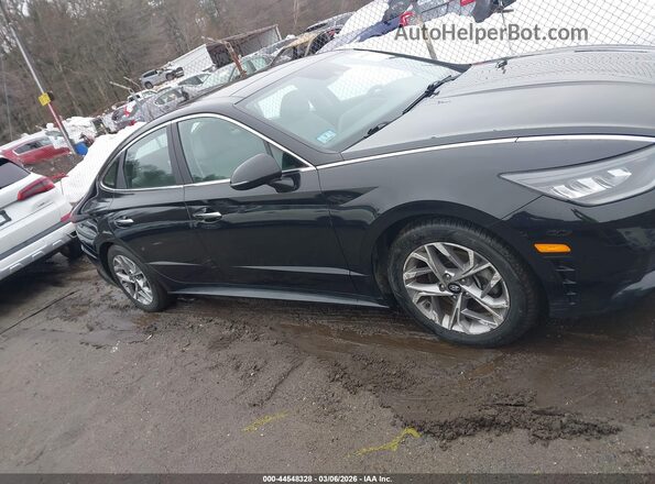 5NPEF4JAXMH104572 2021 HYUNDAI SONATA Black Rear interior view