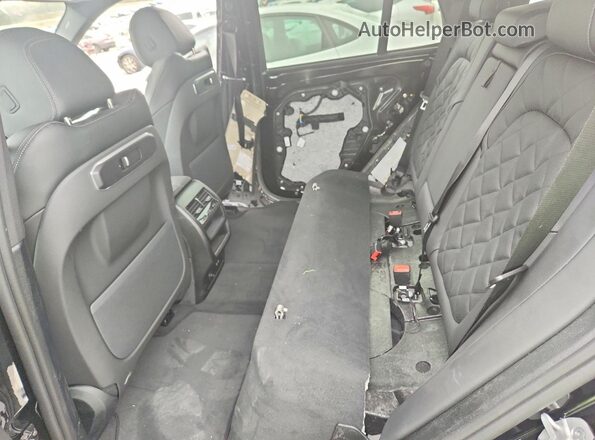 5UX13EU09T9325781 2026 BMW X5 Черный Вид задней части салона