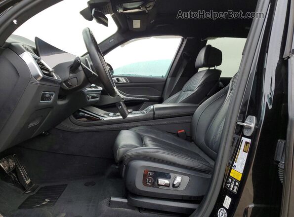 5UX23EM00P9P65933 2023 BMW X7 Black Vista interior delantera