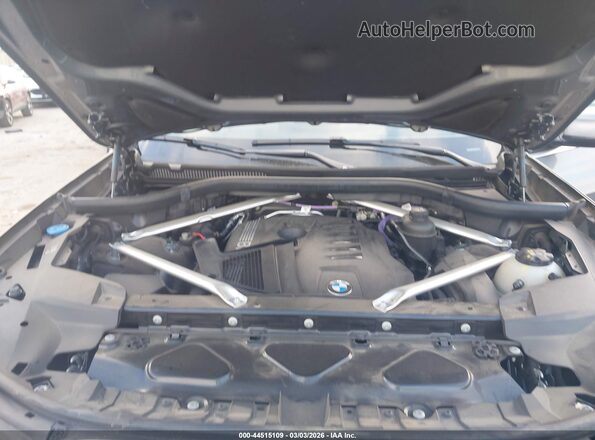 5UX23EM06R9V50477 2024 BMW X7 Gray Rear view