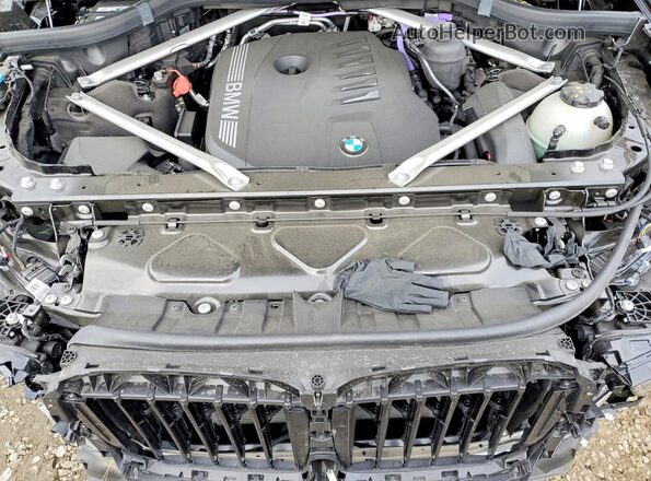 5UX23EM07S9Z37299 2025 BMW X7 Black Widok komory silnika