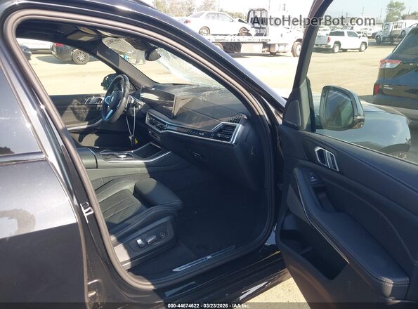 5UX23EU04T9026543 2026 BMW X5 Black Widok wnętrza z przodu