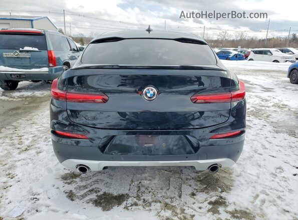 5UX2V1C00L9B76088 2020 BMW X4 Black Rear view