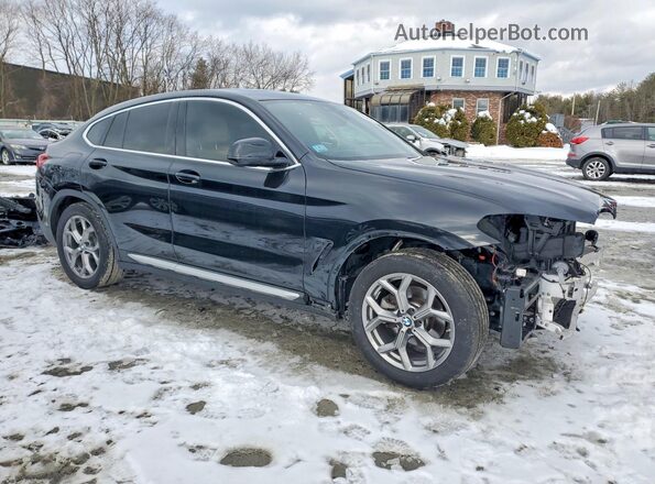 5UX2V1C00L9B76088 2020 BMW X4 Black Front right
