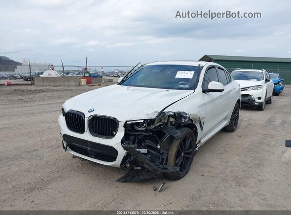 5UX2V1C06M9F26017 2021 BMW X4 White Առջևի ձախ երեք քառորդ տեսարան