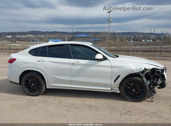 5UX2V1C06M9F26017 2021 BMW X4 White Սալոնի հետևի տեսք