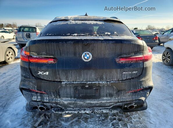 5UX2V1C08M9D99948 2021 BMW X4 Black Widok z tyłu