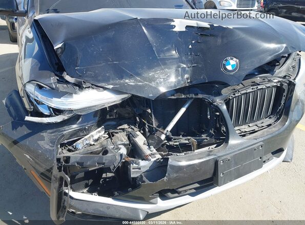 5UX2V1C08M9F13754 2021 BMW X4 Black Դիմացի տեսք