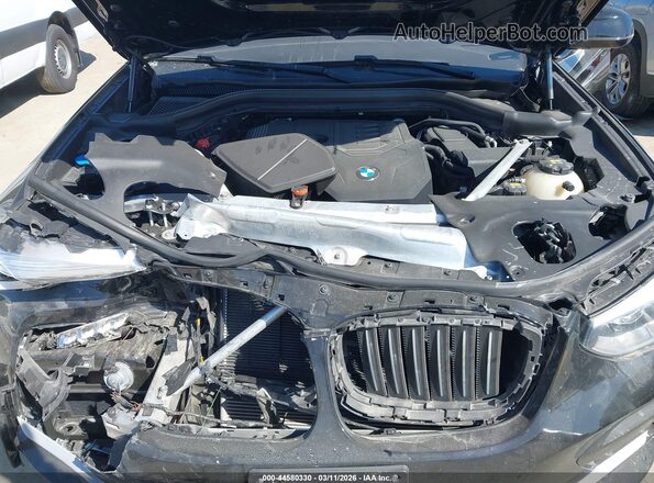 5UX2V1C08M9F13754 2021 BMW X4 Black Հետևի տեսք