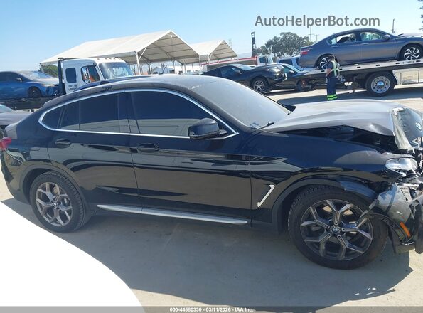 5UX2V1C08M9F13754 2021 BMW X4 Black Սալոնի հետևի տեսք