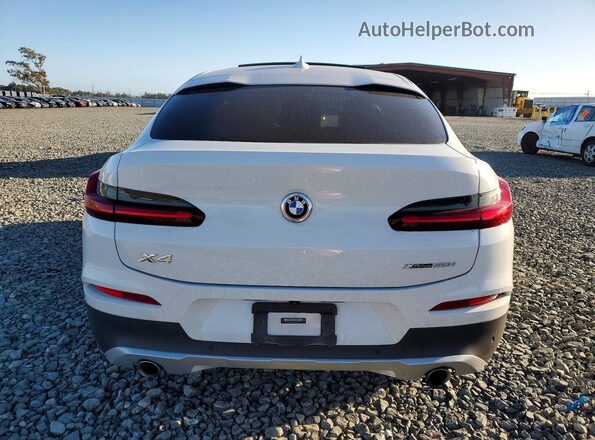 5UX2V1C09M9G15077 2021 BMW X4 White Rear view