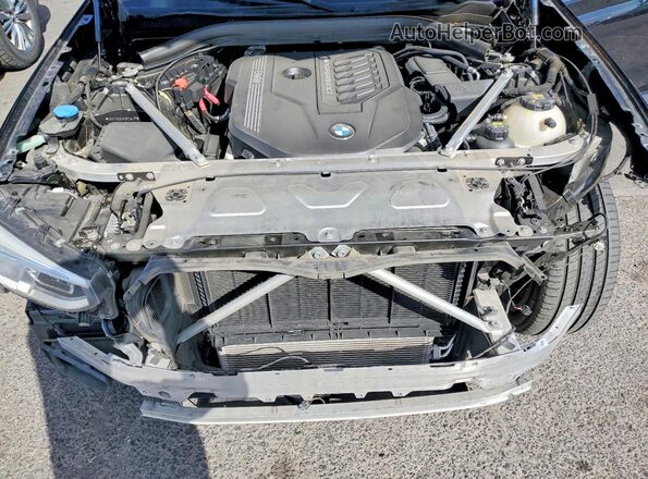 5UX2V5C01M9F26417 2021 BMW X4 Black Widok wnętrza z tyłu