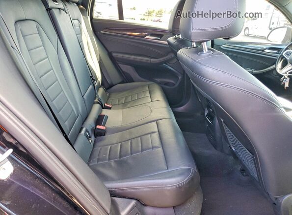 5UX2V5C01M9F26417 2021 BMW X4 Black Widok tylnych siedzeń