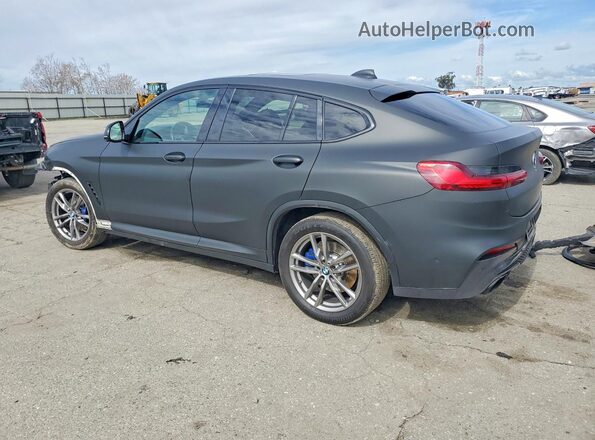 5UX2V5C04M9F93657 2021 BMW X4 Black Trasero izquierdo