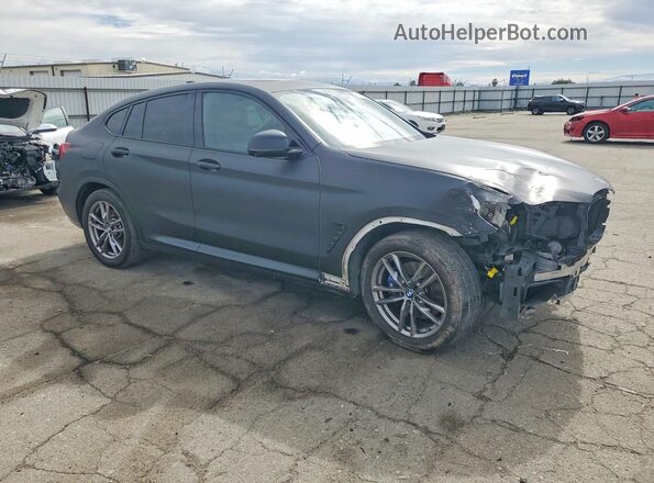 5UX2V5C04M9F93657 2021 BMW X4 Black Delantero derecho