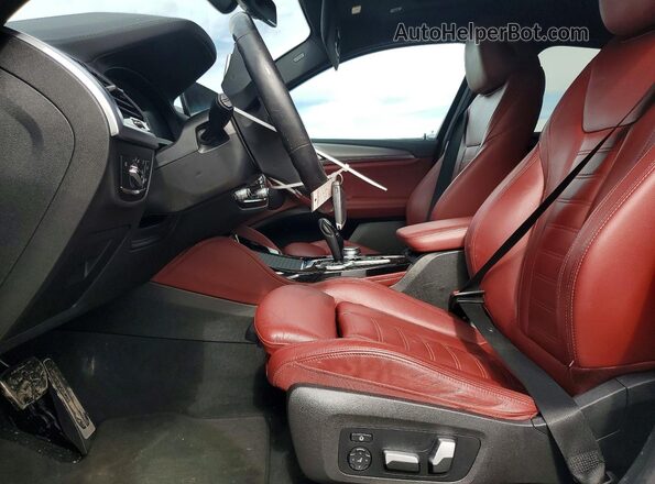 5UX2V5C04M9F93657 2021 BMW X4 Black Vista interior delantera