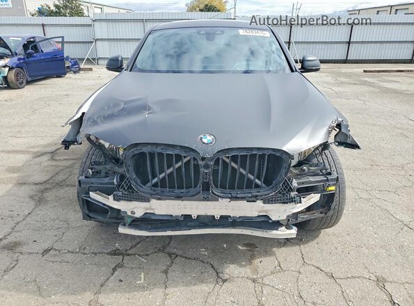 5UX2V5C04M9F93657 2021 BMW X4 Black Vista frontal