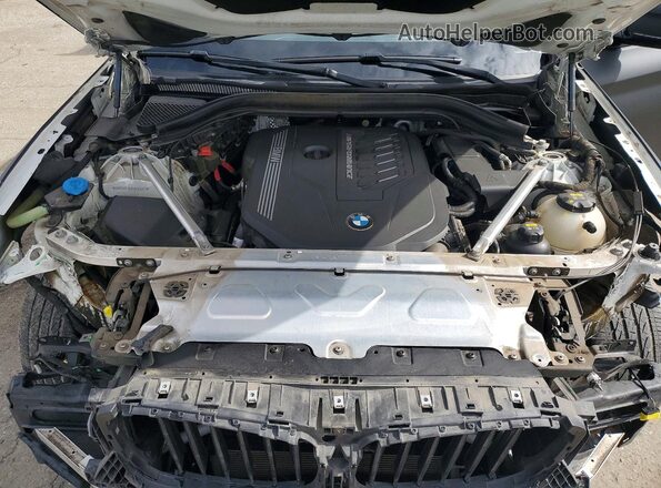 5UX2V5C04M9F93657 2021 BMW X4 Black Vista interior trasera