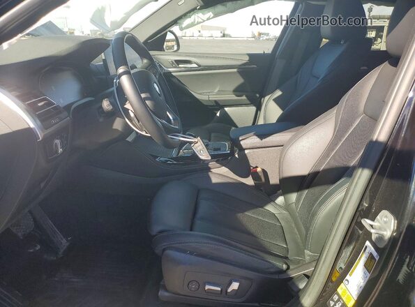 5UX33DT01P9P09757 2023 BMW X4 Black Vista interior delantera