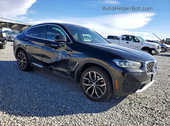 5UX33DT01P9P09757 2023 BMW X4 Black Delantero derecho